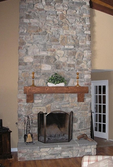 Rustic Eldorado Stone veneer fireplace - Click here for larger view
