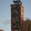 Custom Masonry Brick Chimney - diagonal brick pattern
