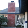 Custom Masonry Brick Chimney with chimney cap and spark arrestor