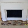 Simple Plaster Fireplace with tile hearth