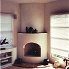 Kiva Style Plaster Fireplace with spanish tile hearth and mantel