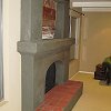 Custom Fireplace with spanish tile hearth under construction before plaster finish