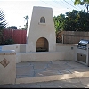 Custom Masonry Stucco Outdoor BBQ Island and Fireplace