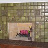 Batchelder Tile Fireplace with contrasting tiled hearth